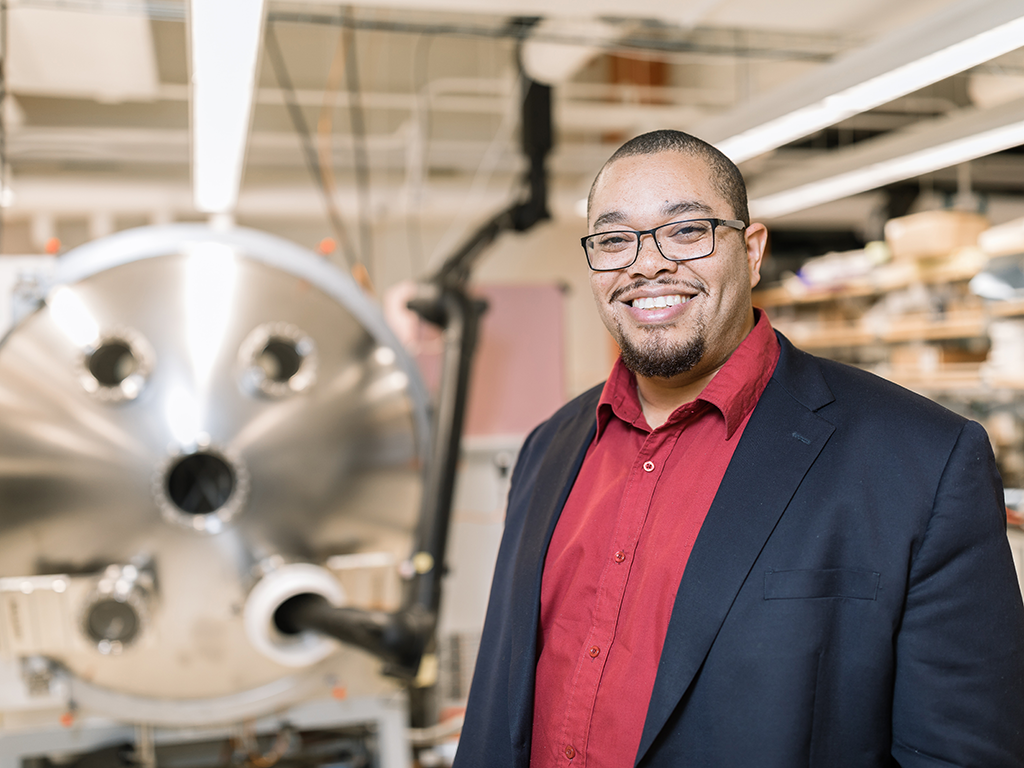 An image of a smiling man. 