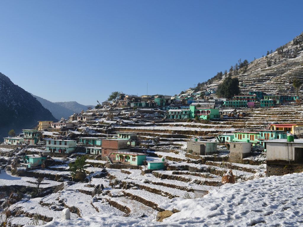 Distance shot of the town of Ransi, India, which is nestled in the Himalaya.