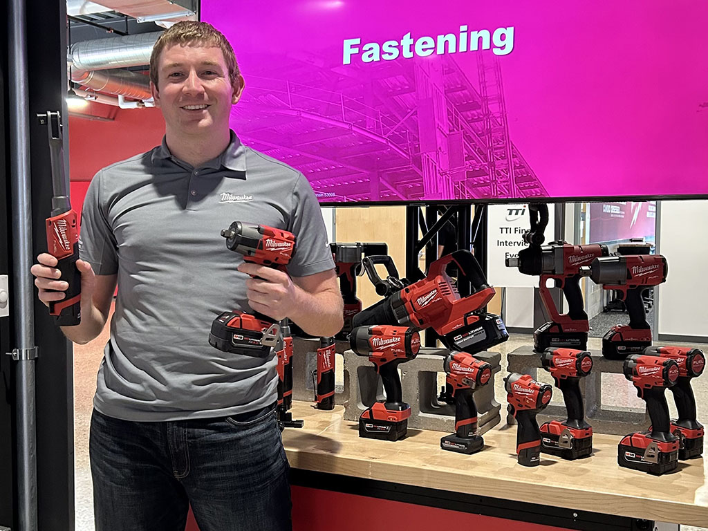 Evan Brown holding power tools